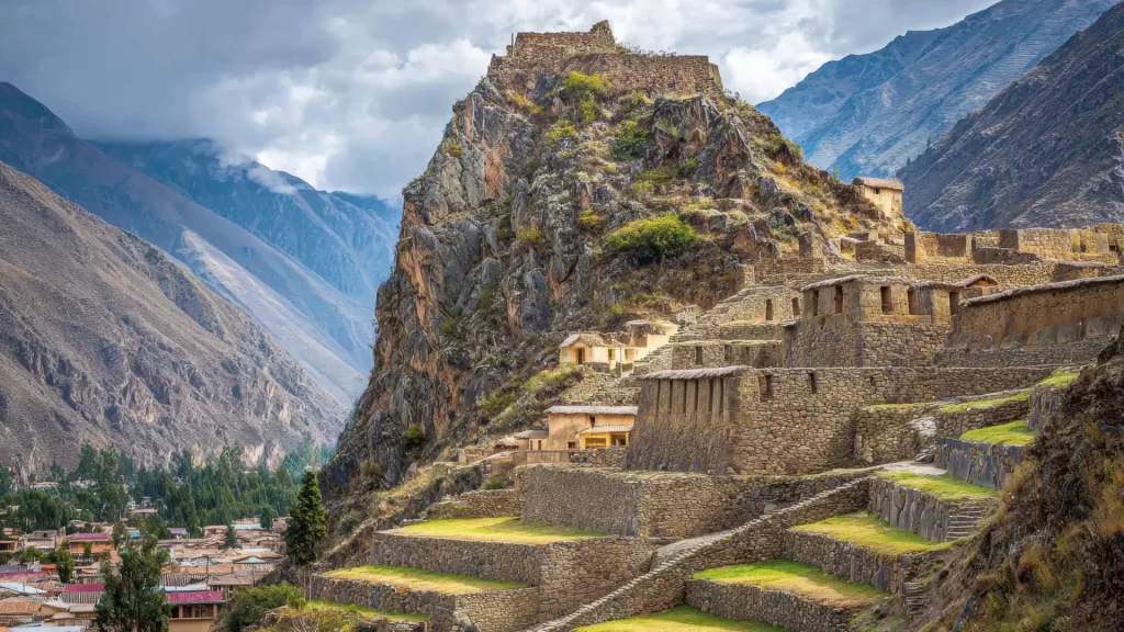 Panoramic view of Ollantaytambo’s Inca terraces and stone structures built into the mountainside featured in the guide to Ollantaytambo.-Qosqo Expeditions
