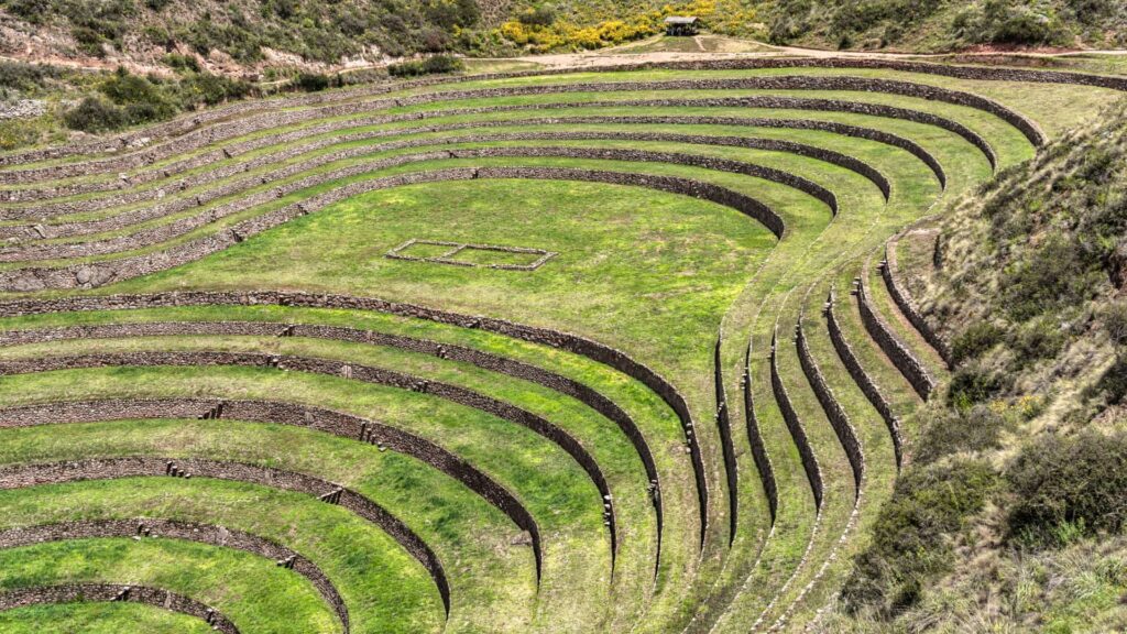 Concentric stone terraces at Moray archaeological site in Peru, used for Inca agricultural experiments part of the Moray Inca ruins.-Qosqo Expeditions